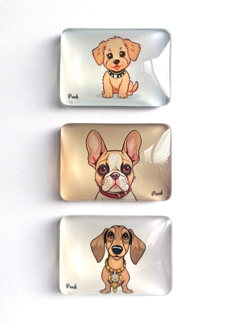 Three rectangular glass fridge magnets with rounded corners, stacked vertically. Each coaster features a different cartoon dog illustration: a tan puppy, a French Bulldog, and a dachshund, all with the name 'Punk' written in black script near the bottom left of their respective designs.